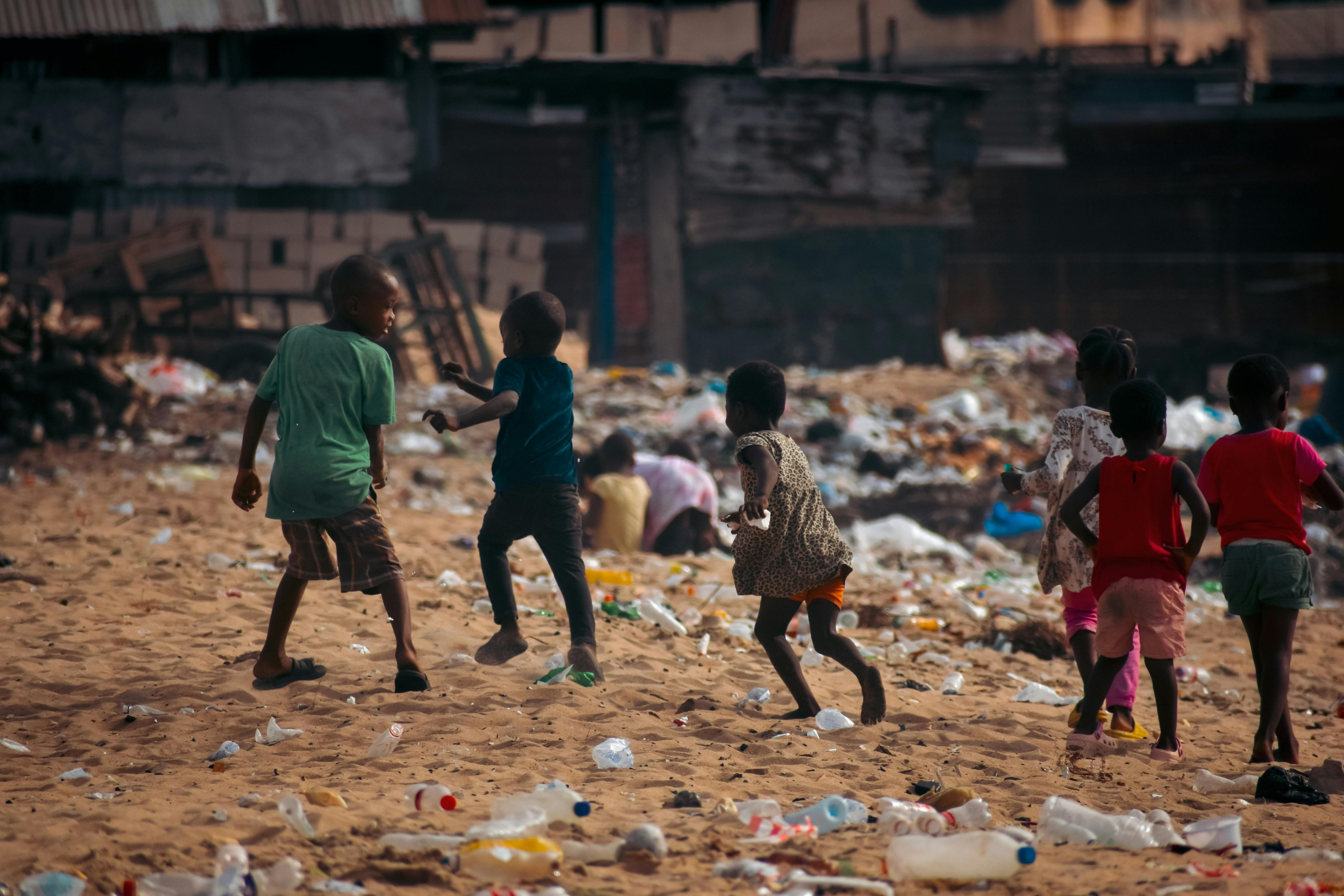 Children playing in trash
